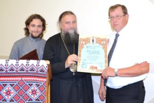 Bishop Iov has awarded President of Orthodox V parishes Yakim Lopushinsky with a certificate of merit. Fr Alex Suraev